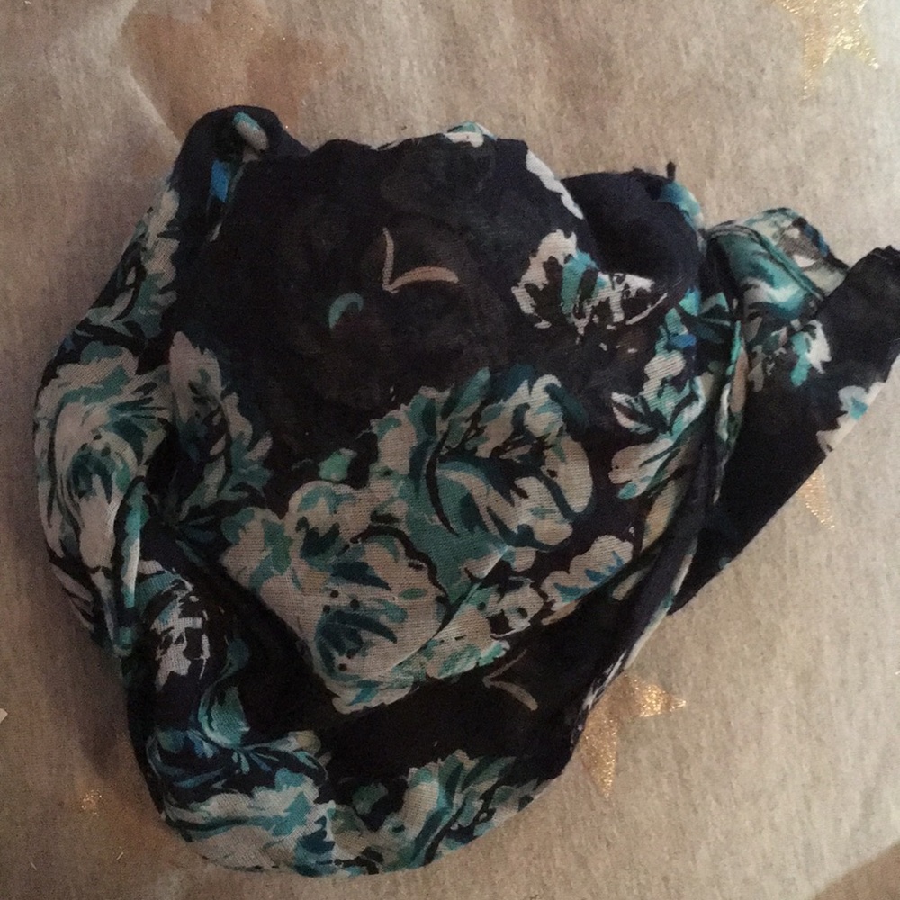 A floral navy and other types of blue scarf